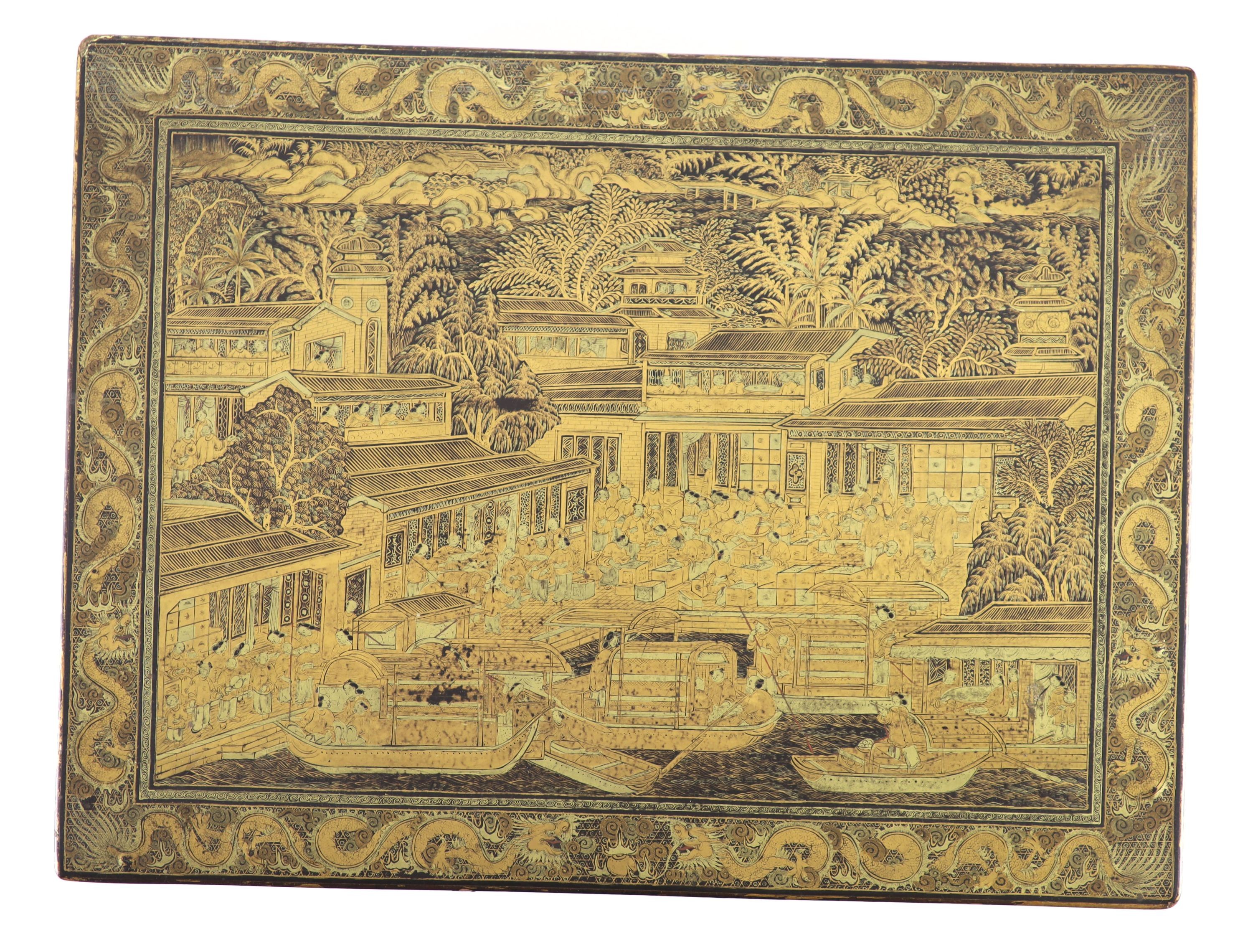 A Chinese export gilt decorated black lacquer tea chest, early 19th century, 35 cm wide, including side carrying handles